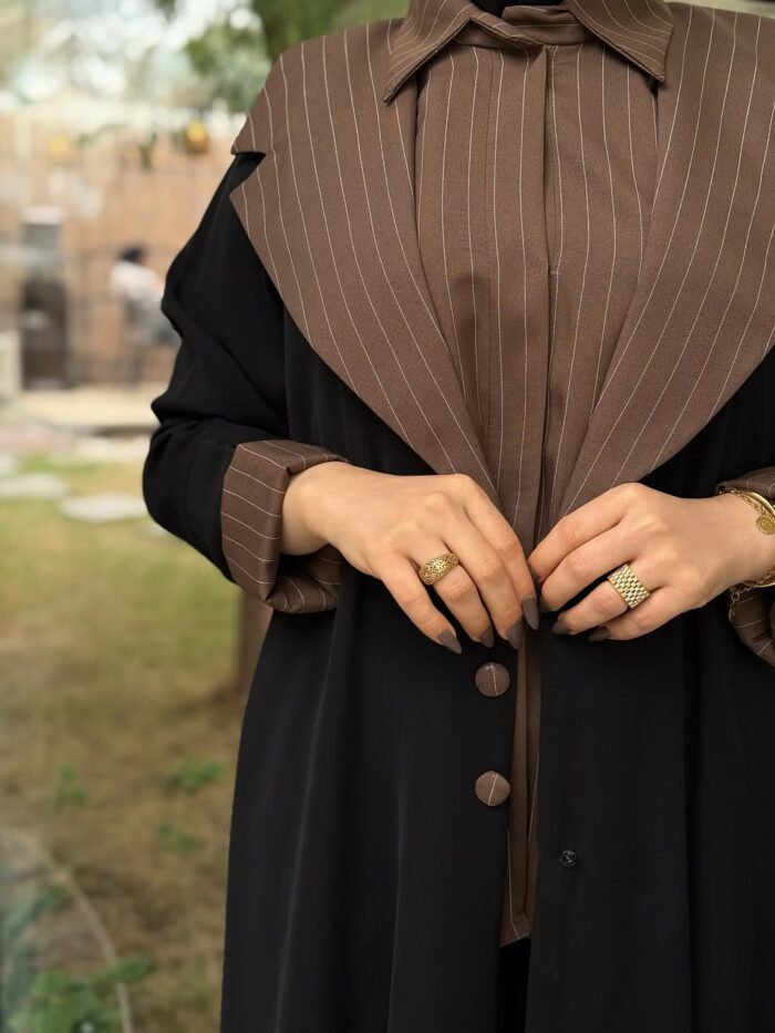 عباية بتصميم أنيق وانسيابي للسفر