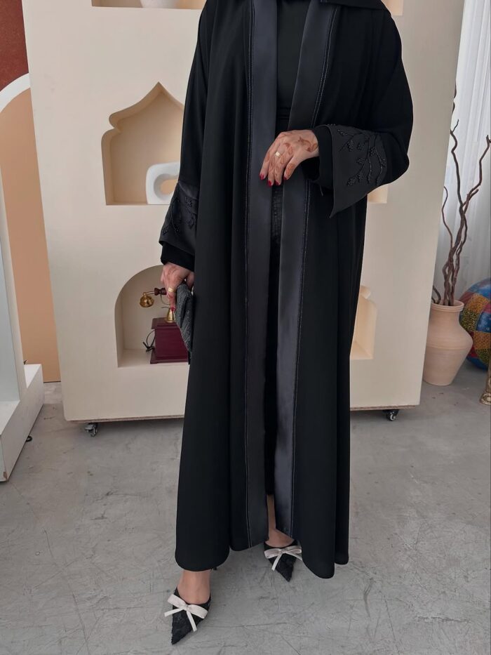 WhatsApp Image 2026-02-11 at 8.25.40 PM عبايه انيقه نص كلوش تطريز كم