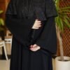 عباية بشت سوداء بأكمام مزخرفة بتصاميم دائرية - "عبايه نمبر ون" - فخامة وأناقة